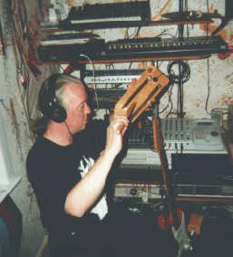 Alan playing the home-made spring-board, with drum-stick, via contact-mic, through the Yamaha delay and other effects