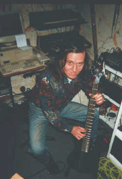 Steve domenstrates his snazzy new Manhattan 5 string bass guitar